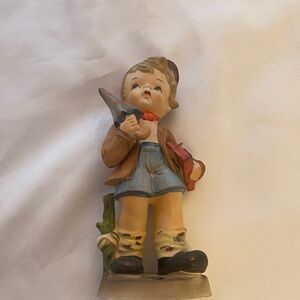 Brinnco vintage boy with umbrella and book